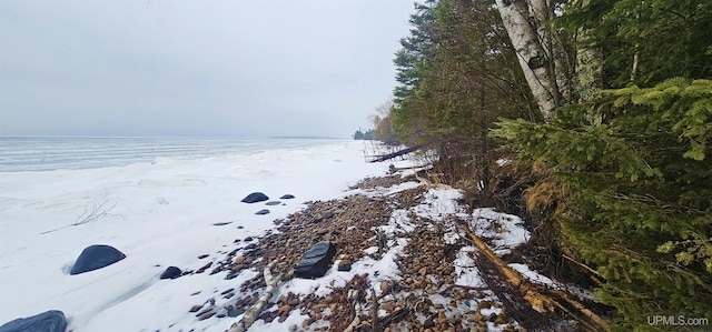 property view of water featuring a beach view