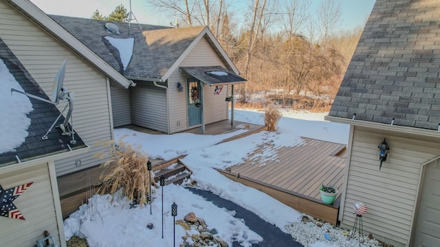 view of snow covered deck