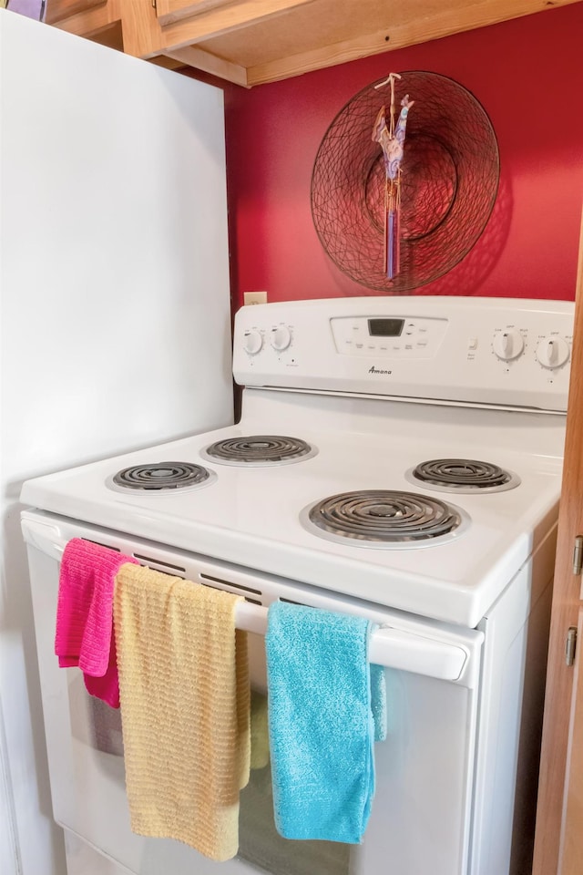 interior space with white electric range oven