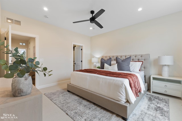 carpeted bedroom featuring a ceiling fan, recessed lighting, visible vents, and baseboards