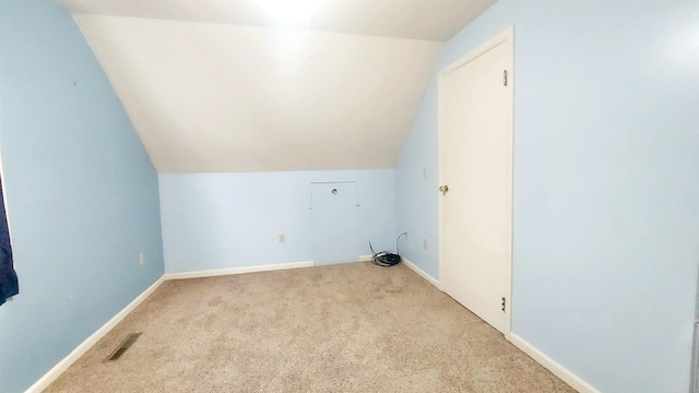 laundry room featuring baseboards, visible vents, and carpet flooring