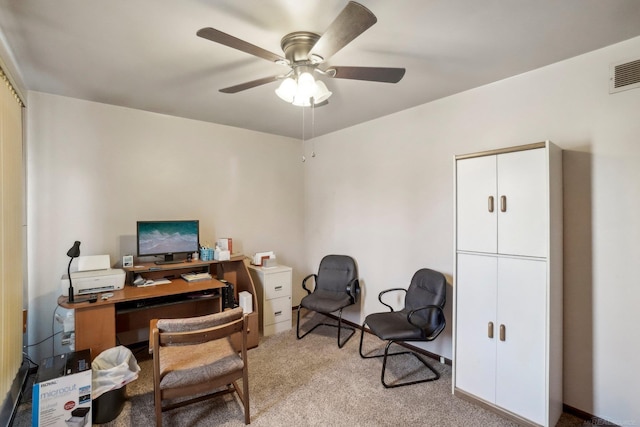 office with light carpet, ceiling fan, and visible vents