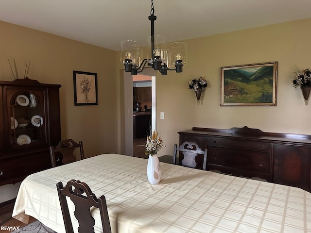 bedroom with a notable chandelier