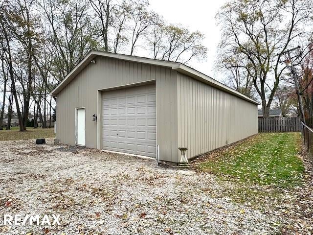 detached garage with fence