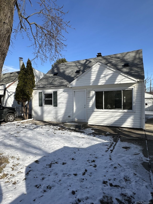 view of snow covered property