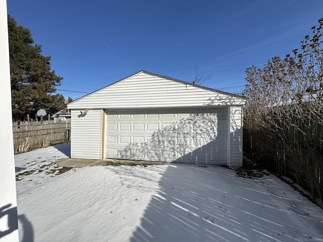 detached garage with fence