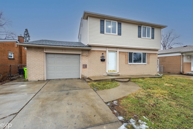 view of front of property featuring concrete driveway, brick siding, a front yard, and fence