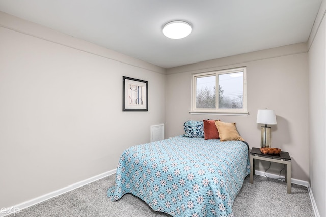 carpeted bedroom with baseboards