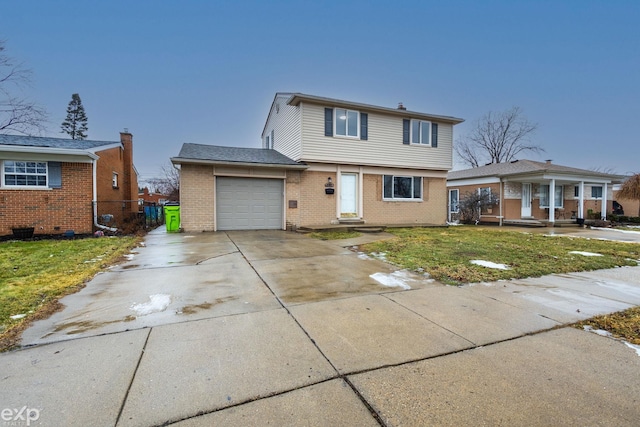 view of front of property featuring a garage, brick siding, fence, concrete driveway, and a front yard