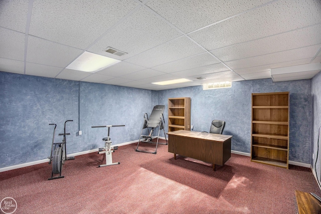 home office with carpet floors, visible vents, and baseboards