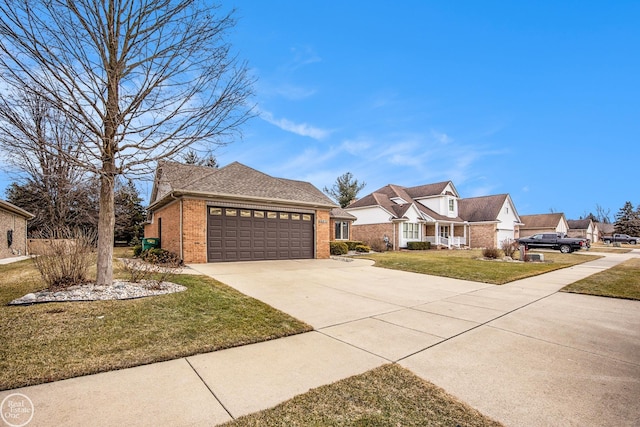 view of front facade featuring brick siding, roof with shingles, concrete driveway, an attached garage, and a front yard