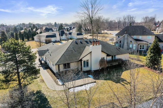 drone / aerial view with a residential view