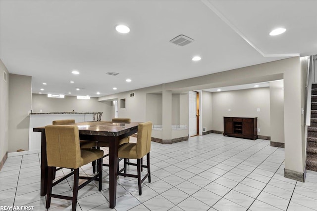 dining space with visible vents, stairway, and recessed lighting