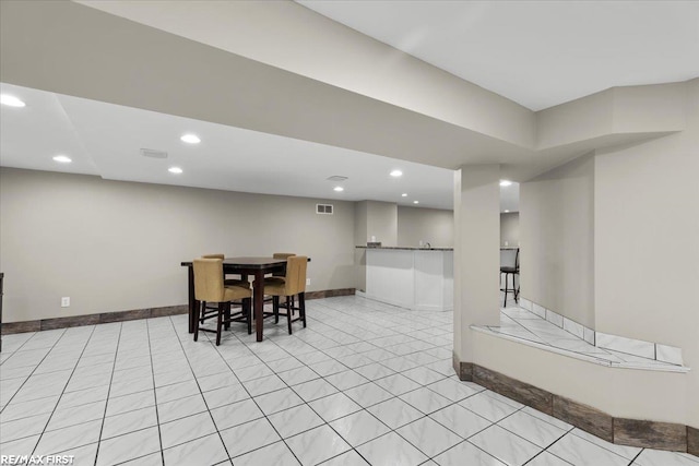 dining area with recessed lighting, visible vents, and baseboards