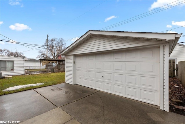 detached garage with fence