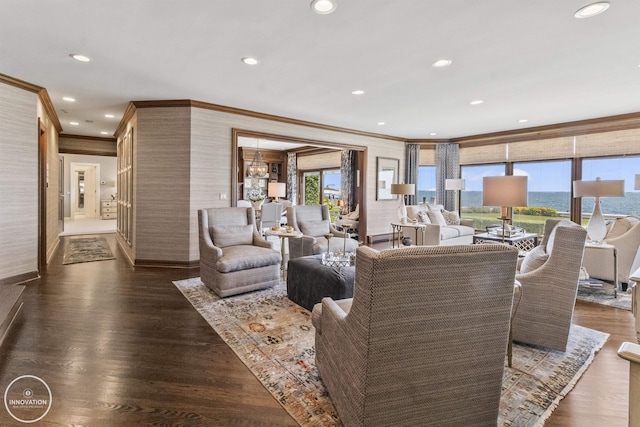 living room featuring ornamental molding, recessed lighting, dark wood finished floors, and baseboards