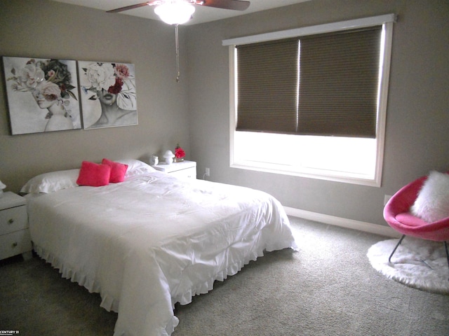 bedroom with carpet, baseboards, and ceiling fan