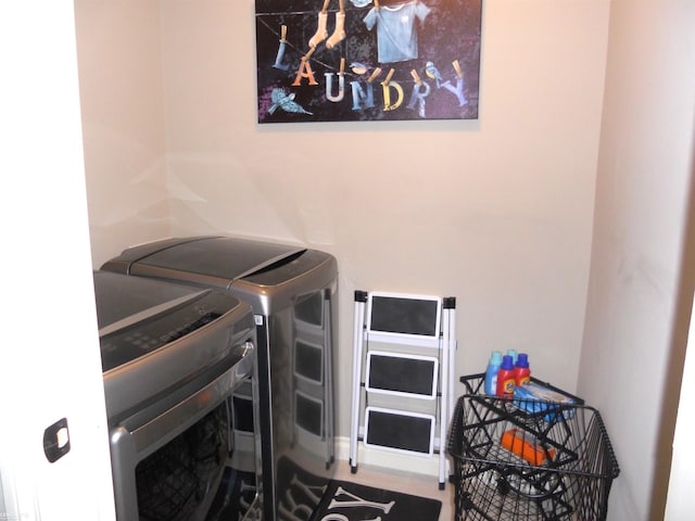 laundry area featuring washer and dryer and laundry area