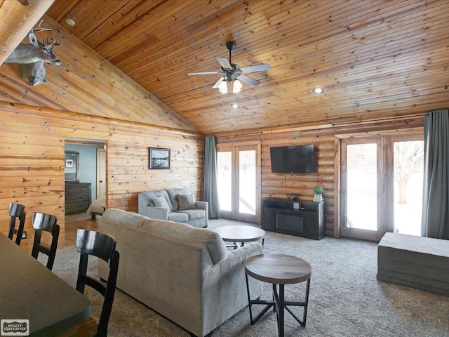 living area featuring a ceiling fan, wood ceiling, carpet, log walls, and high vaulted ceiling