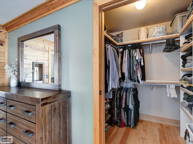 spacious closet featuring wood finished floors