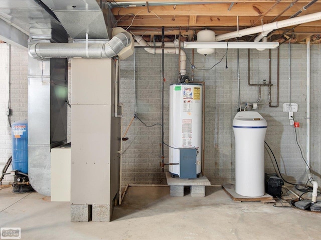 utility room featuring water heater