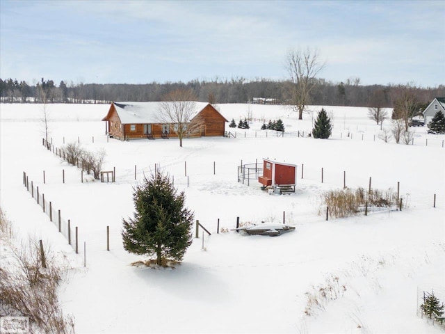 view of snow covered property