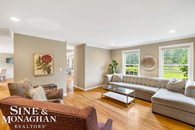 living area with crown molding, recessed lighting, wood finished floors, and baseboards