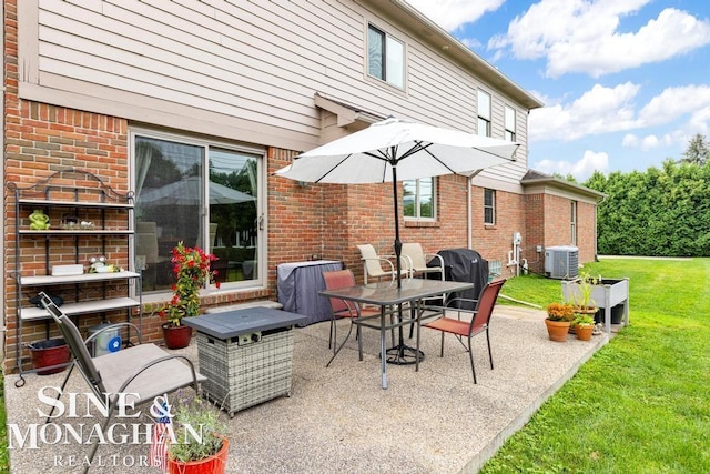 view of patio / terrace with central air condition unit and a grill