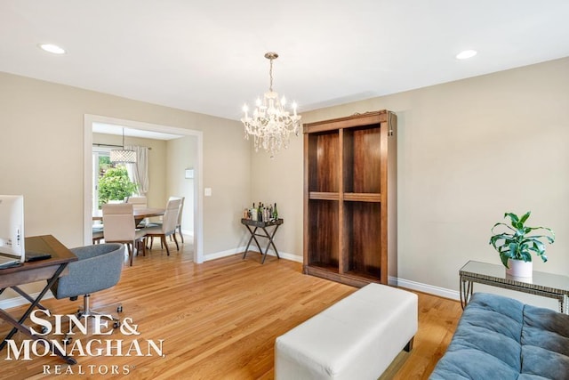 home office with a chandelier, recessed lighting, baseboards, and light wood finished floors