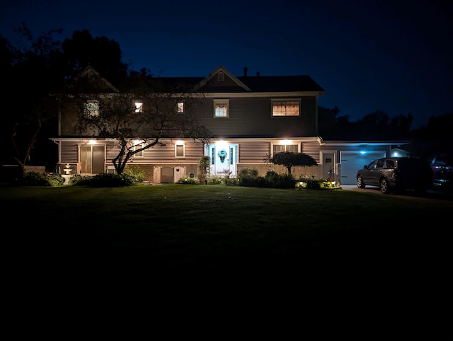 traditional-style home with a lawn