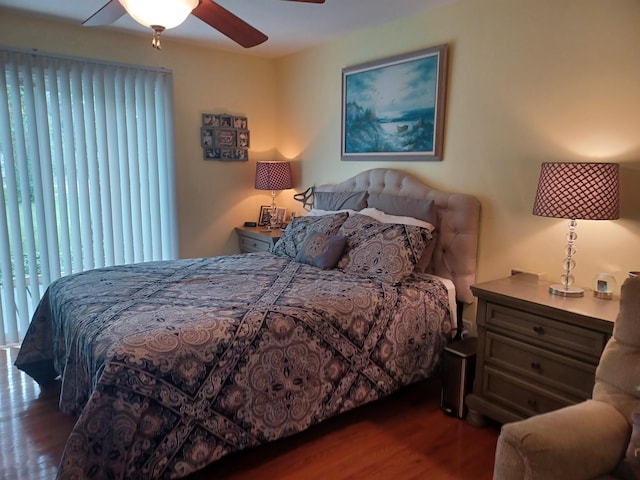 bedroom featuring ceiling fan and wood finished floors