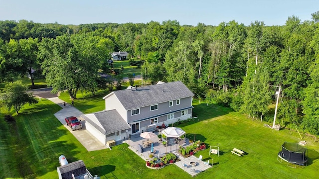 bird's eye view featuring a view of trees