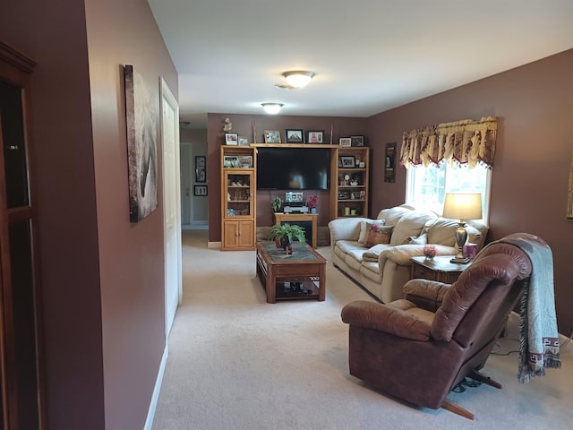 living area with light carpet