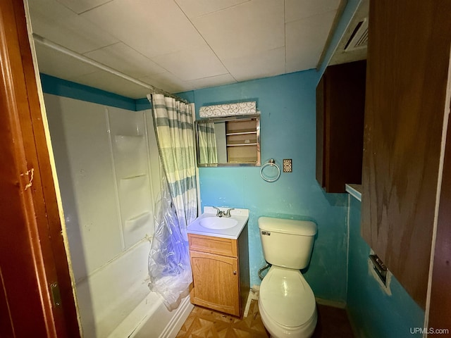 bathroom featuring shower / bathtub combination with curtain, visible vents, vanity, and toilet