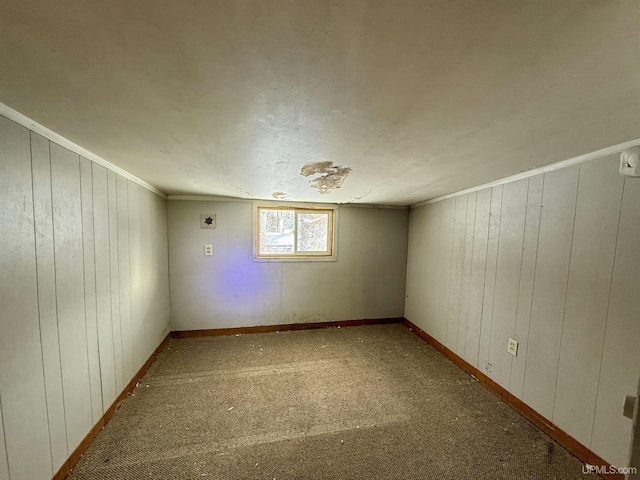 spare room featuring baseboards