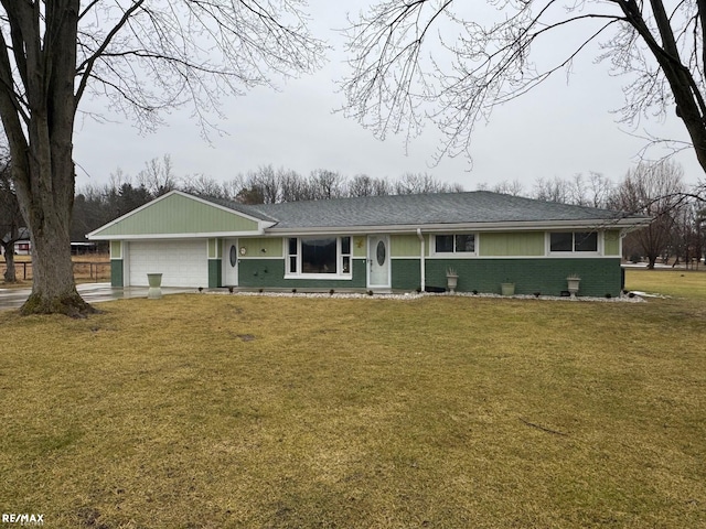 ranch-style home with a front yard, brick siding, driveway, and an attached garage