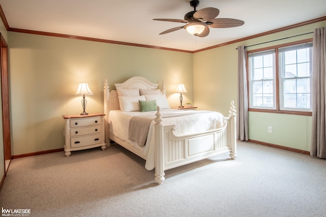 bedroom featuring ornamental molding, carpet, and baseboards