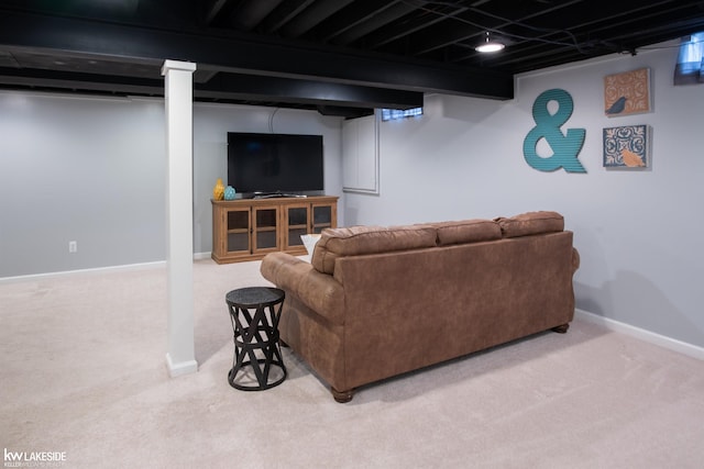 carpeted living room with baseboards