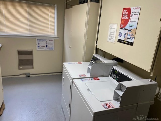 shared laundry area featuring washer and dryer