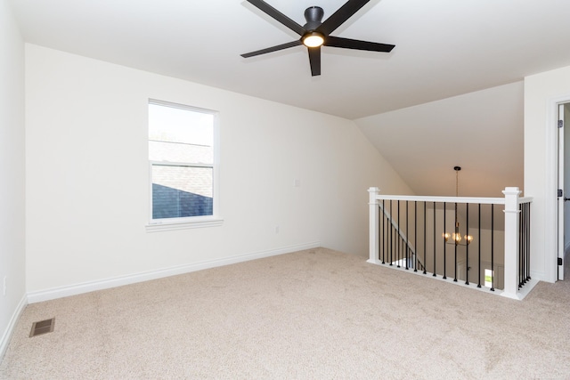 bonus room with ceiling fan, visible vents, vaulted ceiling, and carpet flooring