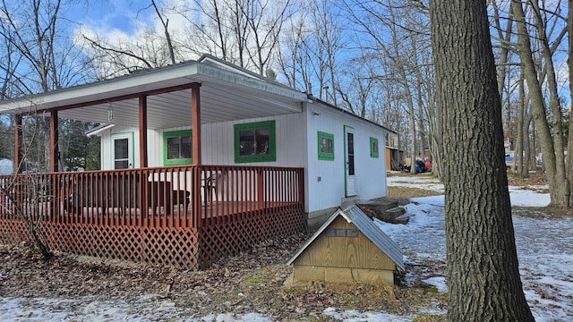 view of snow covered property