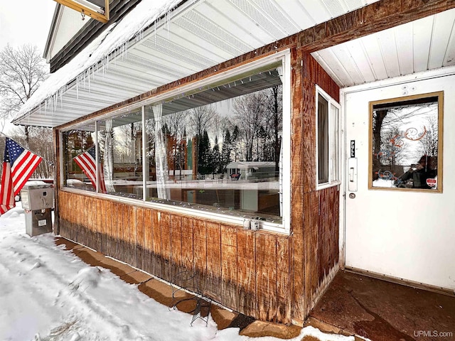 view of snow covered patio