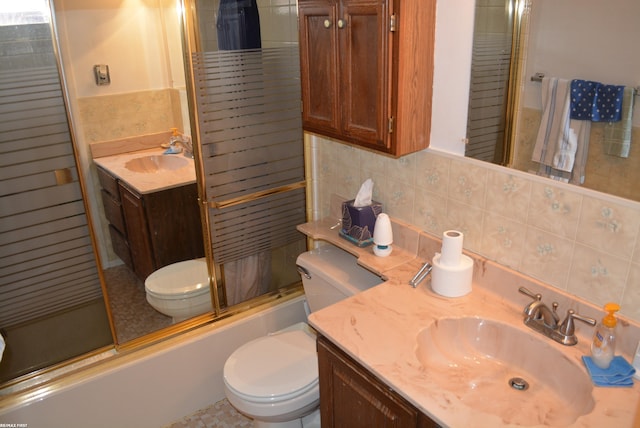 full bath with decorative backsplash, tile walls, toilet, and vanity