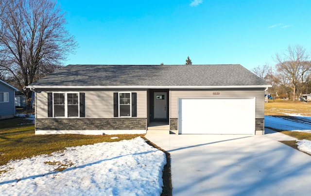 single story home with a garage, concrete driveway, a shingled roof, and stone siding