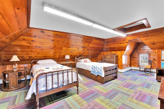 carpeted bedroom with a baseboard heating unit and wood walls