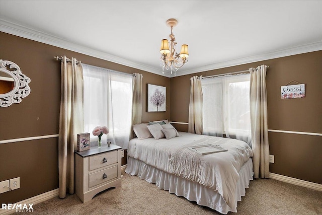 bedroom with multiple windows, a notable chandelier, and light colored carpet