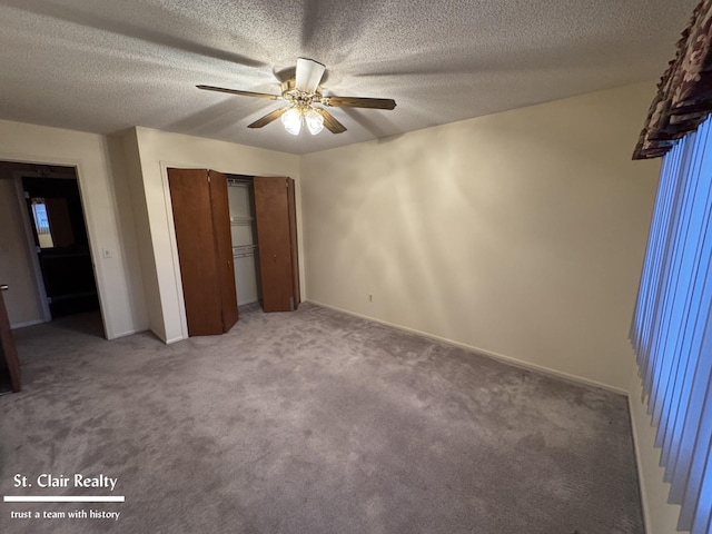 unfurnished bedroom featuring a textured ceiling, a ceiling fan, baseboards, a closet, and carpet