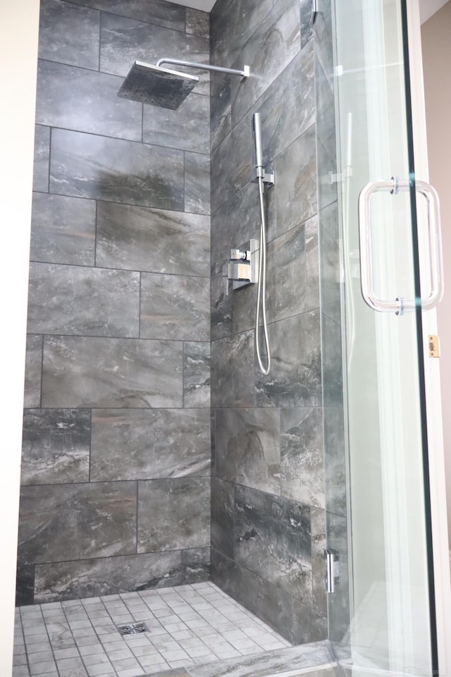 bathroom featuring a shower stall