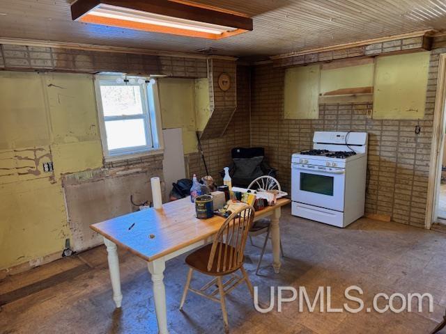 kitchen featuring white gas range oven