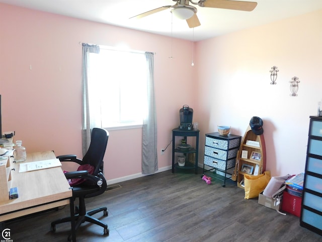 office space featuring wood finished floors, a ceiling fan, and baseboards